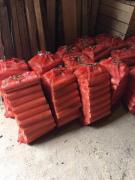 Сухие березовые дрова в сетках